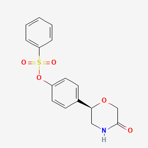 4-[(2R)-5-Oxomorpholin-2-yl]phenyl benzenesulfonate