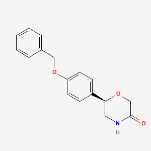 (6R)-6-[4-(Benzyloxy)phenyl]morpholin-3-one