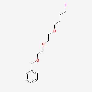 ((2-(2-(4-Iodobutoxy)ethoxy)ethoxy)methyl)benzene