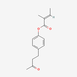 B12649700 4-(3-Oxobutyl)phenyl 2-methylcrotonate CAS No. 84812-72-6