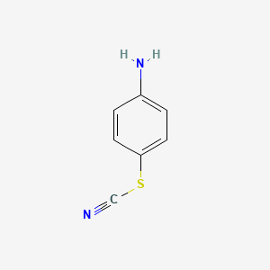 B1265675 Thiocyanic acid, p-aminophenyl ester CAS No. 2987-46-4