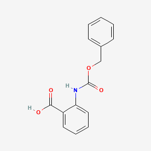 molecular formula C15H13NO4 B1267498 2-{[(Benzyloxy)carbonyl]amino}benzoic acid CAS No. 63254-88-6