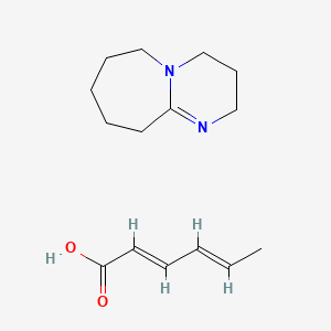 B12692231 (2E,4E)-hexa-2,4-dienoic acid;2,3,4,6,7,8,9,10-octahydropyrimido[1,2-a]azepine CAS No. 63817-78-7