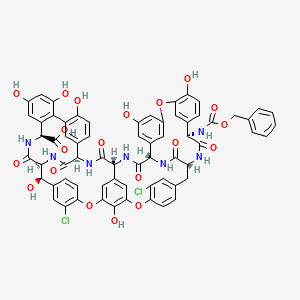 molecular formula C66H51Cl2N7O20 B12693968 (1S,2R,19R,22S,34S,37R,40R,52S)-5,15-dichloro-2,26,31,44,47,49,64-heptahydroxy-21,35,38,54,56,59-hexaoxo-22-(phenylmethoxycarbonylamino)-7,13,28-trioxa-20,36,39,53,55,58-hexazaundecacyclo[38.14.2.23,6.214,17.219,34.18,12.123,27.129,33.141,45.010,37.046,51]hexahexaconta-3,5,8,10,12(64),14,16,23(61),24,26,29(60),30,32,41(57),42,44,46(51),47,49,62,65-henicosaene-52-carboxylic acid 