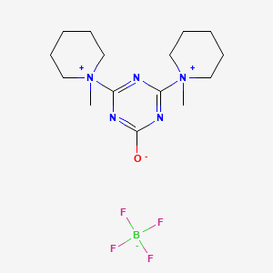 1,1'-(6-Oxido-1,3,5-triazine-2,4-diyl)bis(1-methylpiperidinium) tetrafluoroborate(1-)