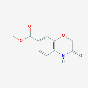 B127040 methyl 3-oxo-3,4-dihydro-2H-1,4-benzoxazine-7-carboxylate CAS No. 142166-00-5