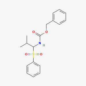 molecular formula C18H21NO4S B1275354 Benzyl N-[2-methyl-1-(phenylsulfonyl)propyl]-carbamate CAS No. 439095-25-7
