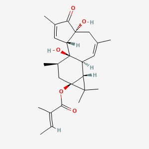 2-Butenoic acid, 2-methyl-, 1,1a,1b,4,4a,5,7a,7b,8,9-decahydro-4a,7b-dihydroxy-1,1,3,6,8-pentamethyl-5-oxo-9aH-cyclopropa(3,4)benz(1,2-e)azulen-9a-yl ester, (1aR-(1aalpha,1bbeta,4abeta,7aalpha,7balpha,8alpha,9aalpha))-