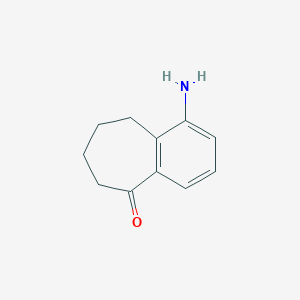 B1280676 1-Amino-6,7,8,9-tetrahydro-5H-benzo[7]annulen-5-one CAS No. 870679-59-7