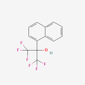 molecular formula C13H8F6O B12821450 1,1,1,3,3,3-Hexafluoro-2-(naphthalen-1-yl)propan-2-ol 