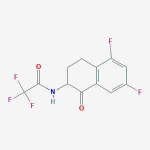 molecular formula C12H8F5NO2 B12821709 N-(5,7-Difluoro-1-oxo-1,2,3,4-tetrahydronaphthalen-2-yl)-2,2,2-trifluoroacetamide 