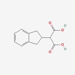 2-(2,3-Dihydro-1H-inden-2-yl)malonic acid