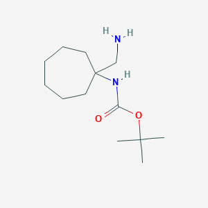 B1283690 tert-butyl N-[1-(aminomethyl)cycloheptyl]carbamate CAS No. 904817-67-0