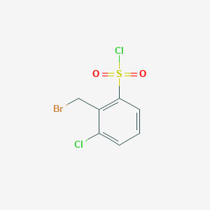 molecular formula C7H5BrCl2O2S B12837052 2-(Bromomethyl)-3-chlorobenzenesulphonyl chloride 