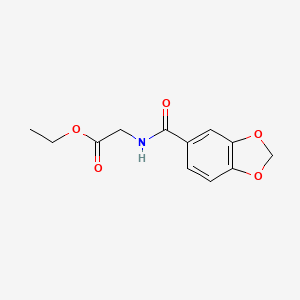 molecular formula C12H13NO5 B12840347 [(Benzo[1,3]dioxole-5-carbonyl)-amino]-acetic acid ethyl ester 