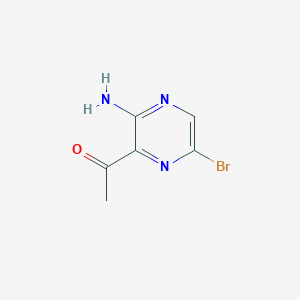 molecular formula C6H6BrN3O B12840408 1-(3-Amino-6-bromopyrazin-2-YL)ethan-1-one 