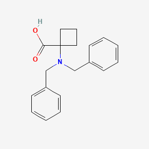 1-(Dibenzylamino)cyclobutanecarboxylic acid