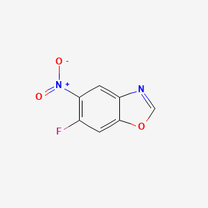 molecular formula C7H3FN2O3 B12841887 6-Fluoro-5-nitro-1,3-benzoxazole 