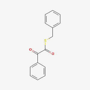 molecular formula C15H12O2S B12845387 Benzeneethanethioic acid, alpha-oxo-, S-(phenylmethyl) ester 