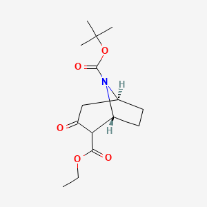 molecular formula C15H23NO5 B12846747 (1R,5S)-8-tert-Butyl 2-ethyl 3-oxo-8-azabicyclo[3.2.1]octane-2,8-dicarboxylate 