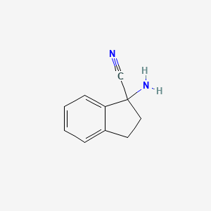 molecular formula C10H10N2 B1284704 1-Aminoindane-1-carbonitrile 