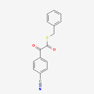 Benzeneethanethioic acid, 4-cyano-alpha-oxo-, S-(phenylmethyl) ester