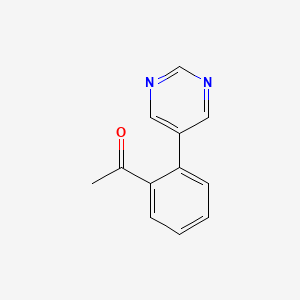 1-[2-(5-Pyrimidinyl)phenyl]ethanone