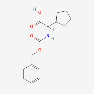 molecular formula C15H19NO4 B1288862 2-{[(Benzyloxy)carbonyl]amino}-2-cyclopentylacetic acid 
