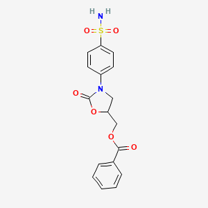 [2-Oxo-3-(4-sulfamoylphenyl)-1,3-oxazolidin-5-yl]methyl benzoate