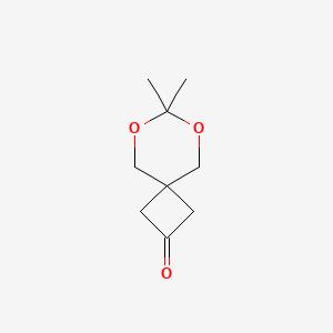 molecular formula C9H14O3 B12930722 7,7-Dimethyl-6,8-dioxaspiro[3.5]nonan-2-one 