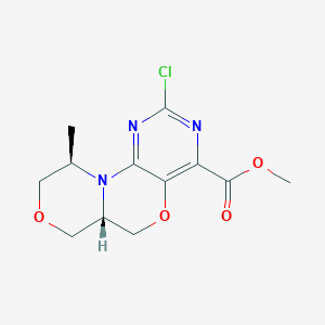 Methyl (6aS,10R)-2-Chloro-10-methyl-6a,7,9,10-tetrahydro-6H-[1,4]oxazino[4,3-d]pyrimido[5,4-b][1,4]oxazine-4-carboxylate