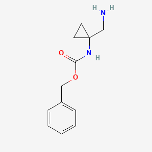 molecular formula C12H16N2O2 B12945885 benzyl N-[1-(aminomethyl)cyclopropyl]carbamate 