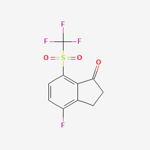 molecular formula C10H6F4O3S B12946024 4-Fluoro-7-(trifluoromethylsulfonyl)indan-1-one 