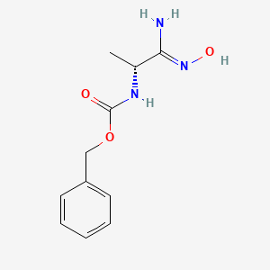 molecular formula C11H15N3O3 B12947446 Benzyl (R,Z)-(1-amino-1-(hydroxyimino)propan-2-yl)carbamate 