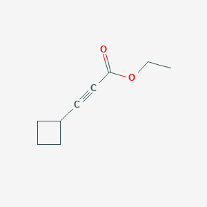 molecular formula C9H12O2 B12947994 Ethyl 3-cyclobutylpropiolate 