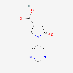 molecular formula C9H9N3O3 B12949965 3-Pyrrolidinecarboxylic acid, 5-oxo-1-(5-pyrimidinyl)- 