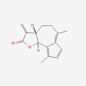 molecular formula C15H16O2 B12957581 (3aS,9bS)-6,9-Dimethyl-3-methylene-3,3a,4,5-tetrahydroazuleno[4,5-b]furan-2(9bH)-one 