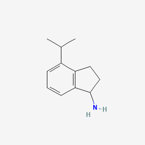 1H-Inden-1-amine, 2,3-dihydro-4-(1-methylethyl)-