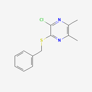 molecular formula C13H13ClN2S B12977497 2-(Benzylthio)-3-chloro-5,6-dimethylpyrazine 