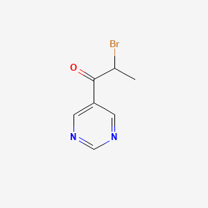 molecular formula C7H7BrN2O B12979335 2-Bromo-1-(pyrimidin-5-yl)propan-1-one 