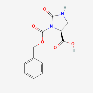molecular formula C12H12N2O5 B1298551 (S)-3-((苄氧基)羰基)-2-氧代咪唑烷-4-羧酸 CAS No. 59760-01-9