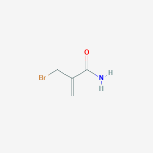 molecular formula C4H6BrNO B12985648 2-(Bromomethyl)acrylamide 