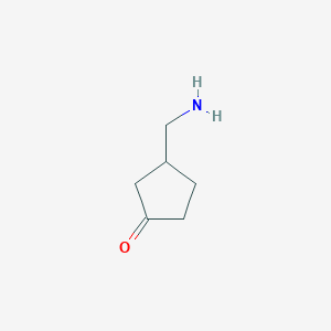 molecular formula C6H11NO B12989326 3-(Aminomethyl)cyclopentan-1-one 