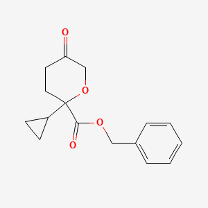 molecular formula C16H18O4 B12989756 Benzyl 2-cyclopropyl-5-oxotetrahydro-2H-pyran-2-carboxylate 