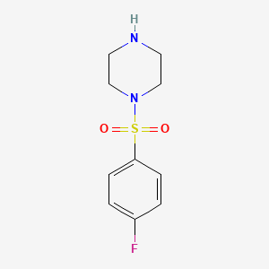 molecular formula C10H13FN2O2S B1299275 1-[(4-フルオロフェニル)スルホニル]ピペラジン CAS No. 27106-49-6