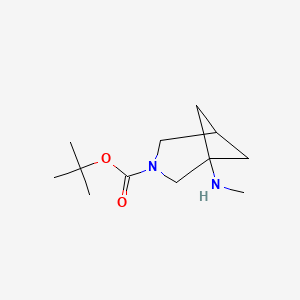 molecular formula C12H22N2O2 B12994900 tert-Butyl 1-(methylamino)-3-azabicyclo[3.1.1]heptane-3-carboxylate 