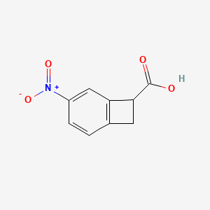 molecular formula C9H7NO4 B13000474 4-Nitrobicyclo[4.2.0]octa-1,3,5-triene-7-carboxylic acid 