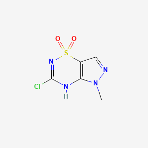 molecular formula C5H5ClN4O2S B13002847 3-Chloro-5-methyl-2,5-dihydropyrazolo[3,4-e][1,2,4]thiadiazine 1,1-dioxide 