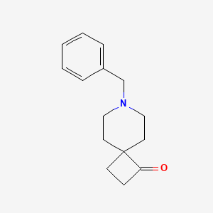 molecular formula C15H19NO B13012163 7-Benzyl-7-azaspiro[3.5]nonan-1-one 