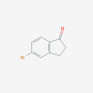 B130187 5-Bromo-1-indanone CAS No. 34598-49-7